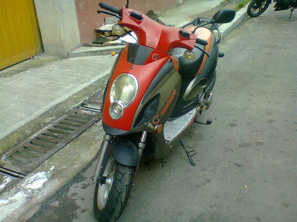 VENDO O PERMUTO TX MOTORS 150 MODELO 2011