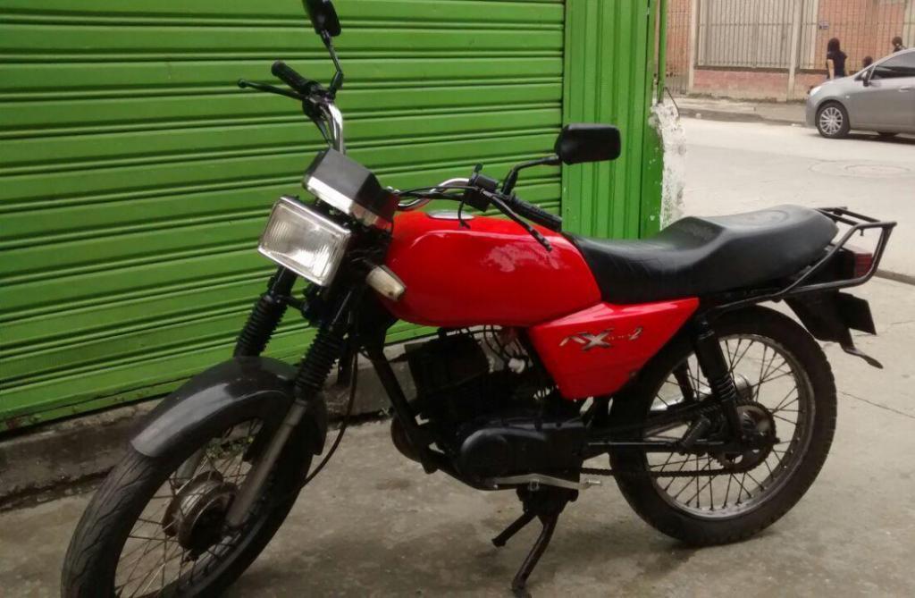 SUZUKI AX 115, ROJO, MODELO 2000, VALLUNA, SIN MULTAS ANDA BUENO