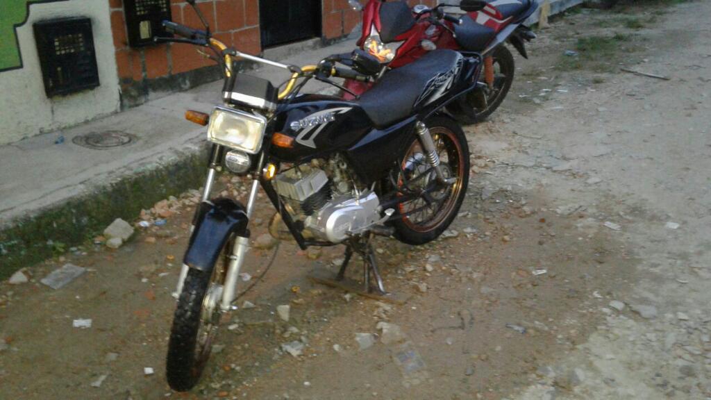 Moto Ax 100