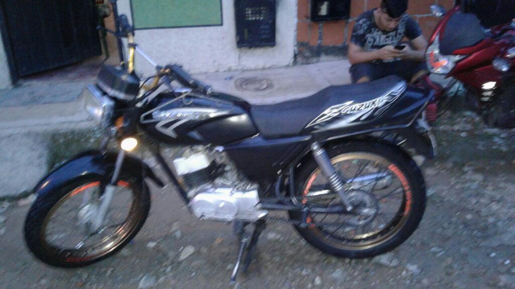 Moto Ax 100