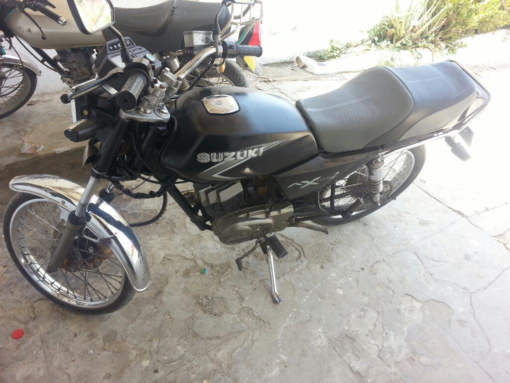 Moto Ax 100