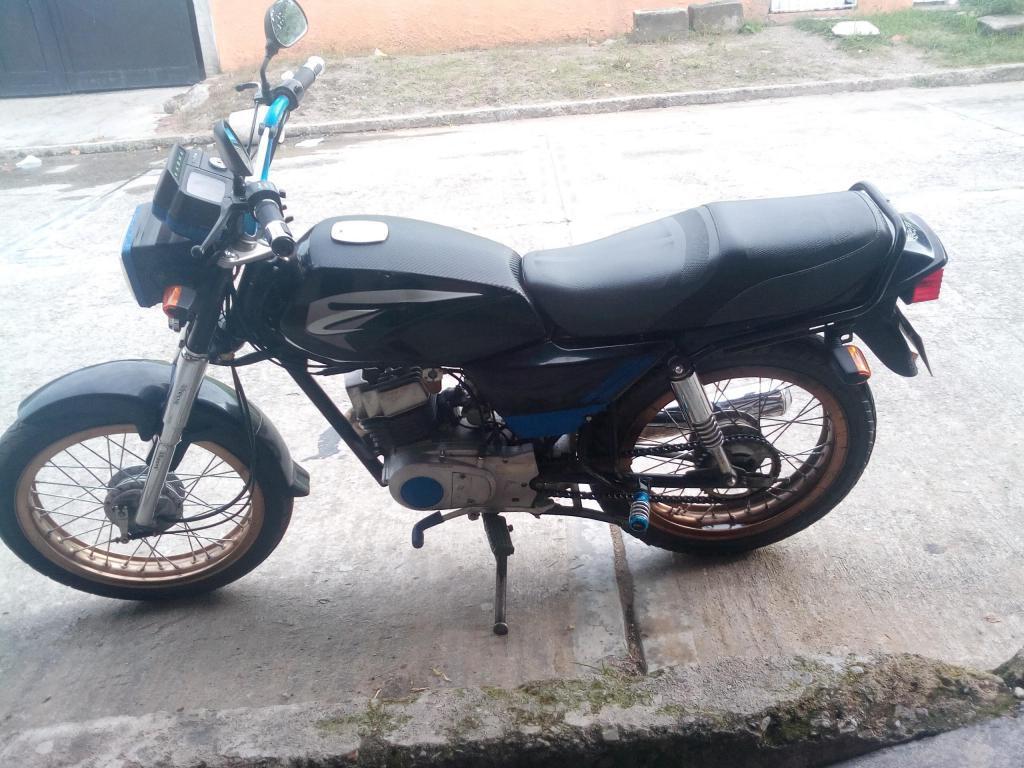 vendo esta moto Ax 100 buen estado