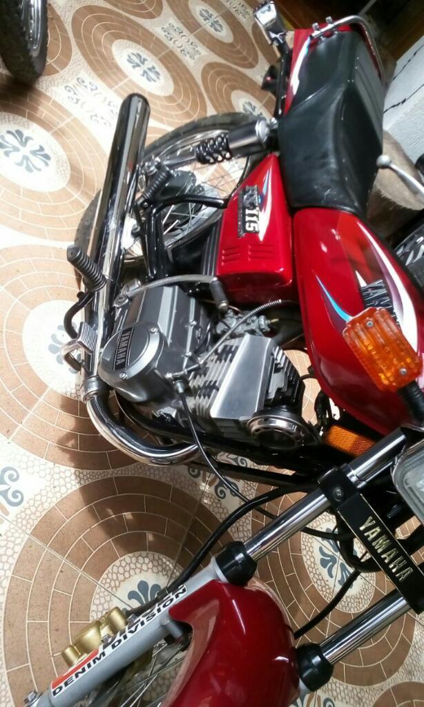 Vend hermosa rx 115 todo original