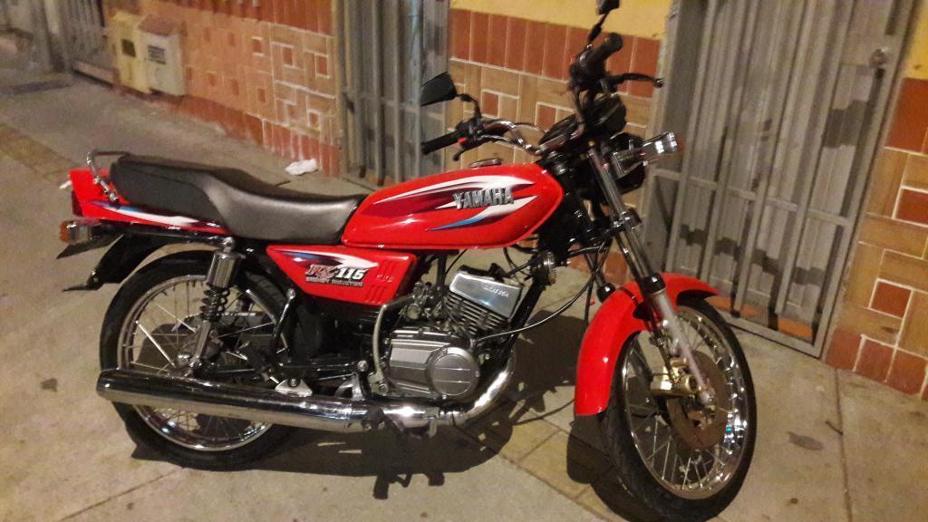 Rx 115 modelo 2006 papeles al dia anombre del comprador 3213077107