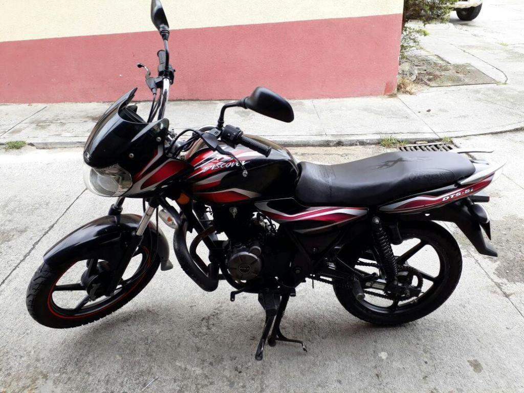 vendo hermosa moto discover 100 o se cambia a otra y se encima