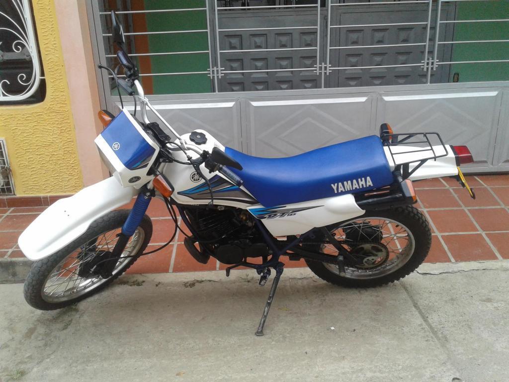 Vendo o cambio Dt 100 excelente en muy buen estado colombiano