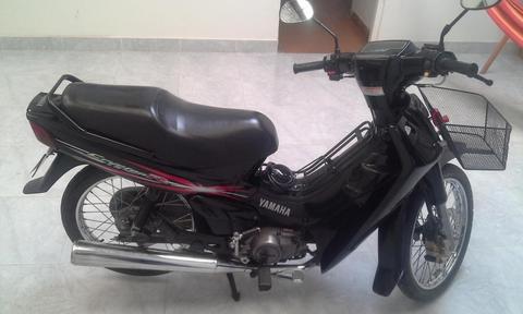 Vendo hermosa moto Crypton Modelo 2010 Papeles al día 34500 Km