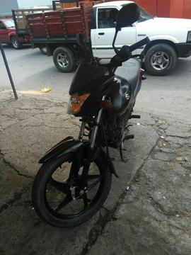 Vendo Moto Al Día en Buen Estado